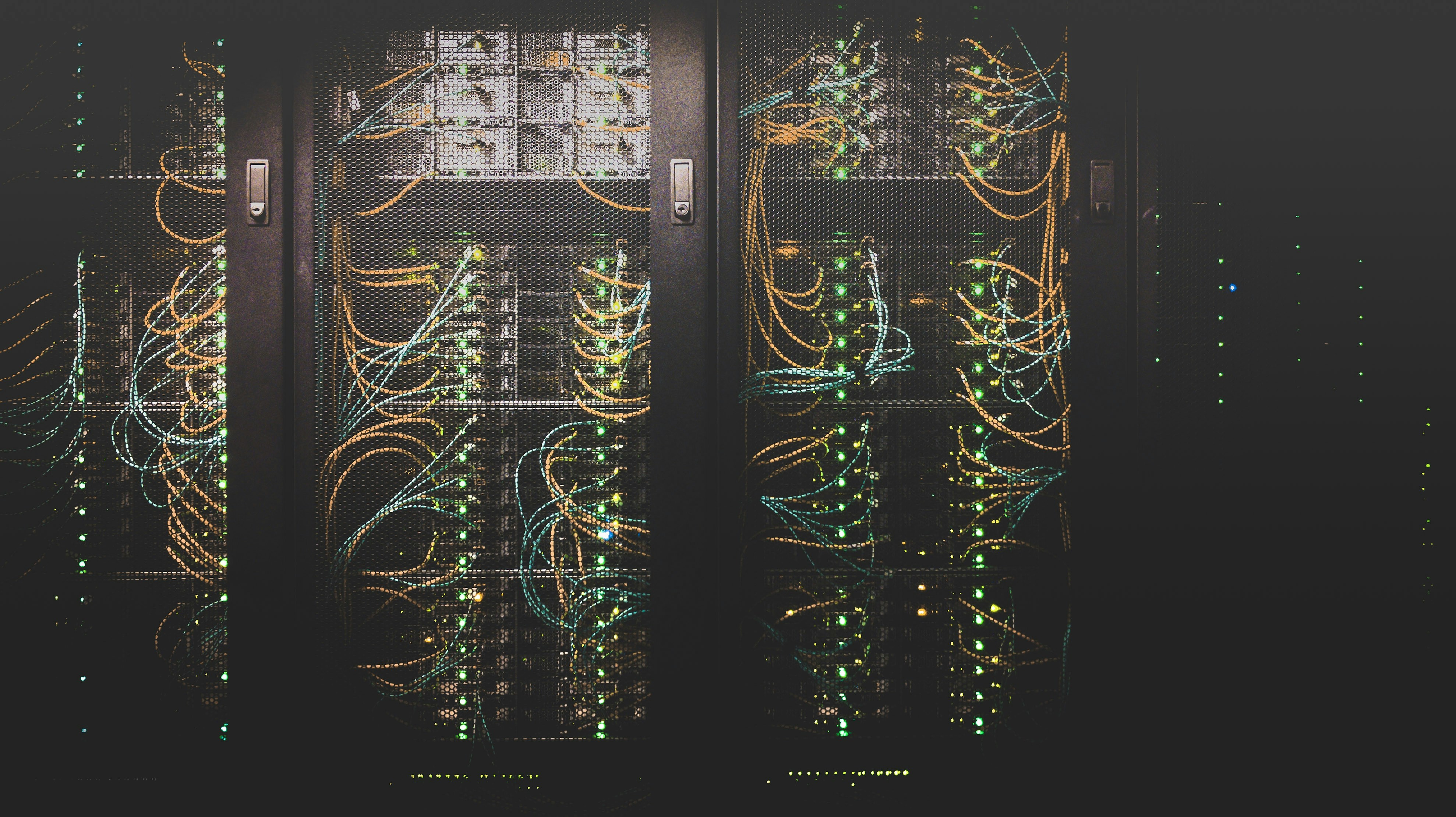 Server racks with neatly bundled network cabling